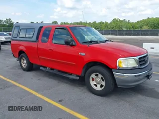 2003 Ford F-150 XL with VIN 1FTRX17243NA84413, listed as a IAAI auction lot 42132813 with 190,715 mi miles. Bid and sale history available at carsss.com. Image 1.