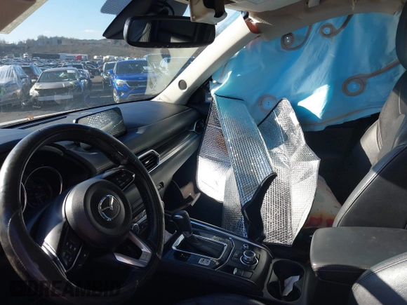 2017 Mazda CX-5 Grand Touring with VIN JM3KFBDL6H0188517, listed as a IAAI auction lot 41093178 with 98,831 mi miles. Bid and sale history available at carsss.com. Image 5.
