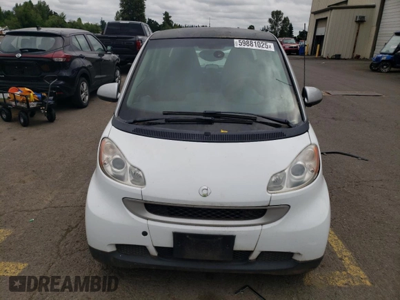 2012 Smart fortwo Pure с VIN WMEEJ3BA1CK573090, выставлен на аукционе Copart как лот 59881025 с пробегом 128 086 миль миль и Чистый • Clean title. История ставок и продаж доступна на DreamBid. Изображение 5.