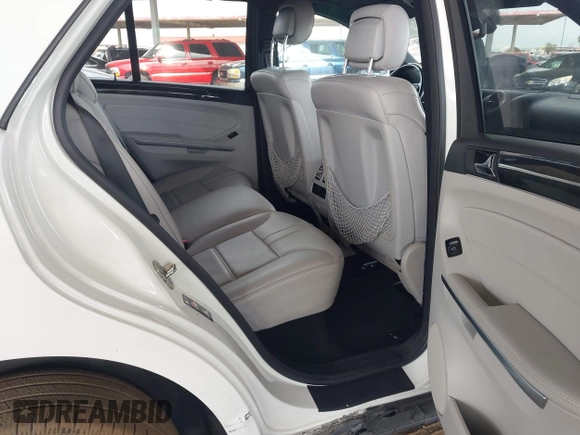 2011 Mercedes-Benz M 350 with VIN 4JGBB5GB8BA743294, listed as a IAAI auction lot 41809638 with 105,157 mi miles and . Bid and sale history available at DreamBid. Image 8.