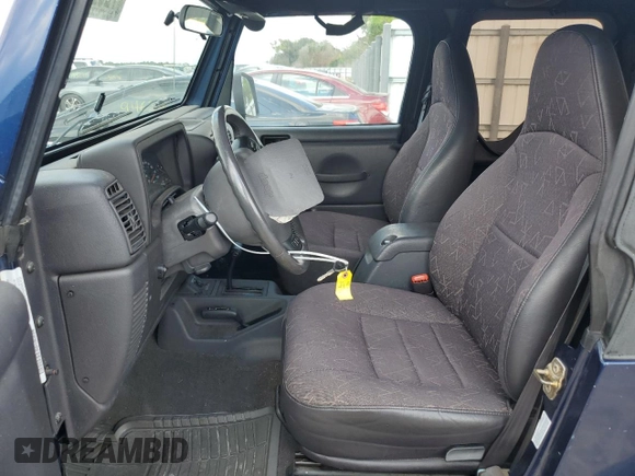 2002 Jeep Wrangler Sport with VIN 1J4FA49S72P722606, listed as a Copart auction lot 72525484 with 104,391 mi miles and Salvage Title. Bid and sale history available at carsss.com. Image 7.