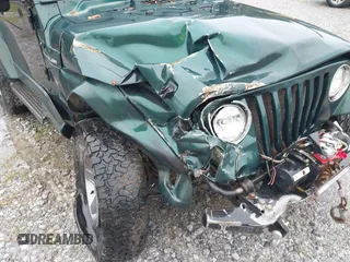 2000 Jeep Wrangler Sahara with VIN 1J4FA59SXYP701098, listed as a IAAI auction lot 41592872 with 1 mi miles. Bid and sale history available at carsss.com. Image 6.