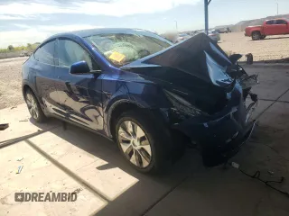 2023 Tesla Model Y Long Range with VIN 7SAYGDEE7PA112865, listed as a Copart auction lot 54626685 with 10,720 mi miles and Salvage Title. Bid and sale history available at DreamBid. Image 4.