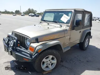 2003 Jeep Wrangler X with VIN 1J4FA39S03P312550, listed as a IAAI auction lot 41837150 with 127,239 mi miles and . Bid and sale history available at DreamBid. Image 17.
