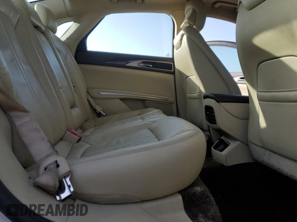 2014 Lincoln MKZ with VIN 3LN6L2JKXER806539, listed as a Copart auction lot 42724215 with 104,283 mi miles and Salvage title. Bid and sale history available at DreamBid. Image 10.