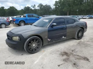 2009 Dodge Charger SE z VIN 2B3KA43DX9H530580, wystawiony jako Copart lot #58381375 z przebiegiem 300 292 mil mil oraz Szkoda całkowita • Salvage title. Historia ofert i sprzedaży dostępna na DreamBid. Obrazek 1.