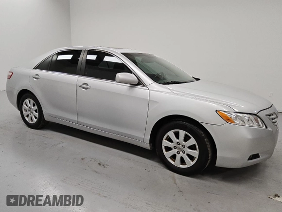 2009 Toyota Camry LE z VIN 4T1BK46K89U595880, wystawiony jako Copart lot #55069935 z przebiegiem 265 831 mil mil oraz Czysty tytuł • Clean title. Historia ofert i sprzedaży dostępna na DreamBid. Obrazek 4.