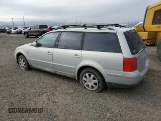 2000 Volkswagen Passat z VIN WVWRH23B6YE274455, wystawiony jako Copart lot #81634704 z przebiegiem 154 076 mil mil oraz Czysty tytuł • Clean title. Historia ofert i sprzedaży dostępna na DreamBid. Obrazek 2.