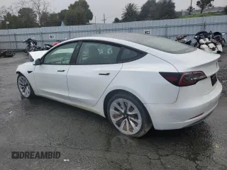 2023 Tesla Model 3 with VIN 5YJ3E1EAXPF544233, listed as a Copart auction lot 44790245 with 32,098 mi miles and Salvage title. Bid and sale history available at DreamBid. Image 2.