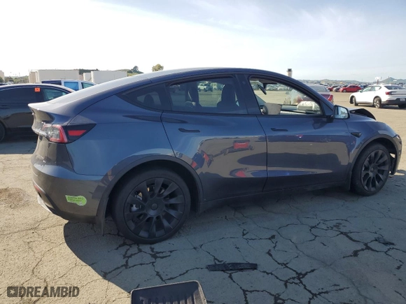 2023 Tesla Model Y Long Range with VIN 7SAYGDEE6PF637757, listed as a Copart auction lot 49819855 with 0 mi miles and Salvage Title. Bid and sale history available at carsss.com. Image 3.