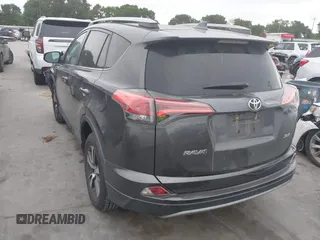 2018 Toyota RAV4 XLE with VIN 2T3WFREV1JW512476, listed as a IAAI auction lot 42177733 with 132,207 mi miles and . Bid and sale history available at DreamBid. Image 3.
