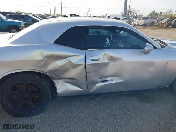 2012 Dodge Challenger SXT Plus with VIN 2C3CDYAG9CH104972, listed as a IAAI auction lot 41738042 with 148,794 mi miles. Bid and sale history available at carsss.com. Image 6.