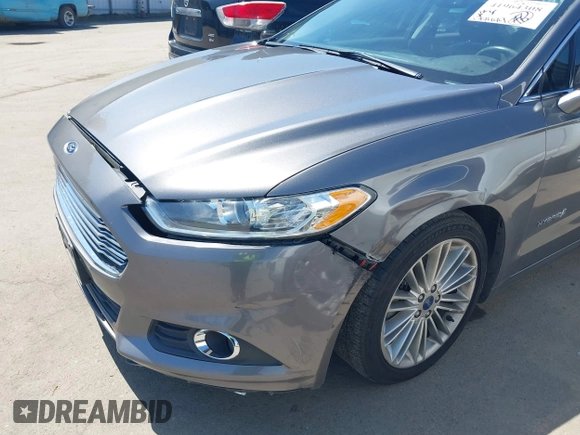 2014 Ford Fusion SE Hybrid with VIN 3FA6P0LU9ER142204, listed as a IAAI auction lot 41964308 with 177,499 mi miles. Bid and sale history available at carsss.com. Image 12.
