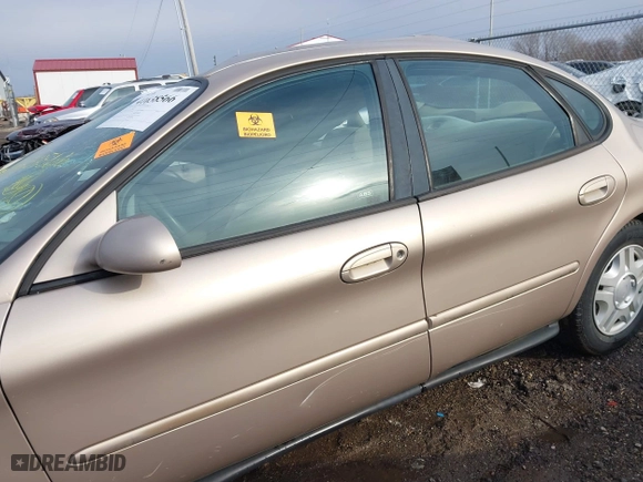 1999 Ford Taurus SE with VIN 1FAFP53U3XA131984, listed as a IAAI auction lot 41638566 with 84,836 mi miles. Bid and sale history available at carsss.com. Image 14.