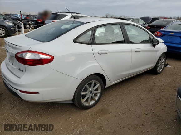 2017 Ford Fiesta SE with VIN 3FADP4BJ2HM136218, listed as a Copart auction lot 82819734 with 74,358 mi miles and Salvage Title. Bid and sale history available at DreamBid. Image 3.
