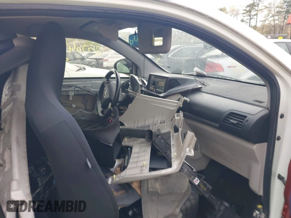 2013 Scion iQ with VIN JTNJJXB06DJ022801, listed as a IAAI auction lot 42152740 with Not provided miles and . Bid and sale history available at DreamBid. Image 5.