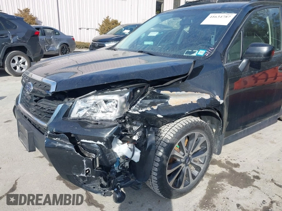2017 Subaru Forester Premium with VIN JF2SJGEC9HH594118, listed as a IAAI auction lot 41634787 with 147,086 mi miles. Bid and sale history available at carsss.com. Image 6.