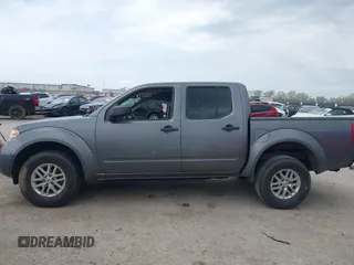 2019 Nissan Frontier SV z VIN 1N6AD0ER2KN789657, wystawiony jako IAAI lot #41880845 z przebiegiem 105 386 mil mil oraz . Historia ofert i sprzedaży dostępna na DreamBid. Obrazek 14.