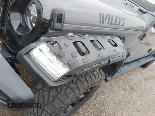 2022 Jeep Gladiator Texas Trail z VIN 1C6HJTAG2NL176011, wystawiony jako IAAI lot #42193864 z przebiegiem 27 219 mil mil oraz . Historia ofert i sprzedaży dostępna na DreamBid. Obrazek 19.