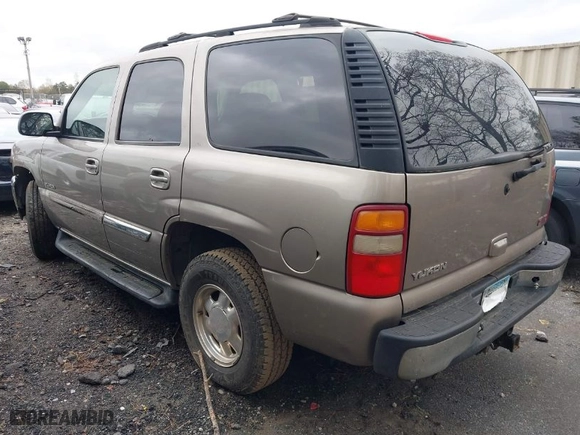 2003 GMC Yukon SLT with VIN 1GKEC13Z23R141573, listed as a IAAI auction lot 41872751 with 1 mi miles. Bid and sale history available at carsss.com. Image 3.