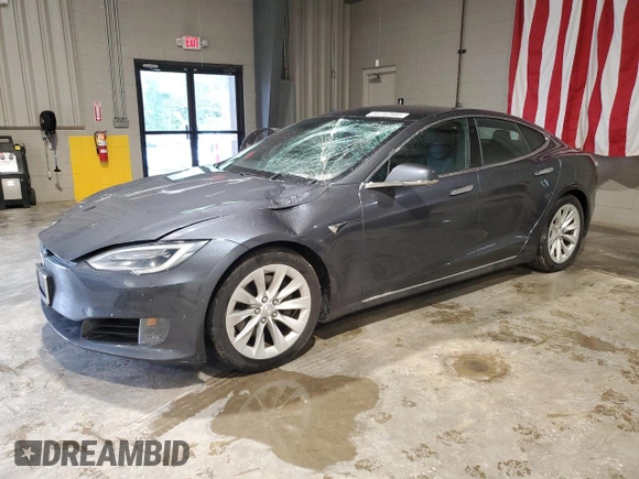 2017 Tesla Model S 100D with VIN 5YJSA1E29HF210731, listed as a Copart auction lot 56762565 with 114,117 mi miles and Salvage title. Bid and sale history available at DreamBid. Image 1.