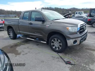 2012 Toyota Tundra 4WD Truck with VIN 5TFUW5F17CX215884, listed as a IAAI auction lot 41849468 with 137,230 mi miles. Bid and sale history available at carsss.com. Image 1.