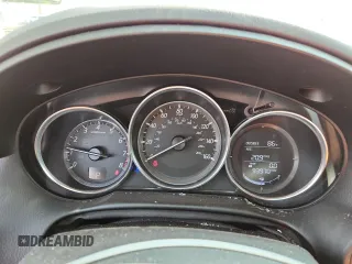 2016 Mazda CX-5 Sport with VIN JM3KE4BYXG0704194, listed as a Copart auction lot 62095735 with 93,970 mi miles and Salvage title. Bid and sale history available at DreamBid. Image 9.