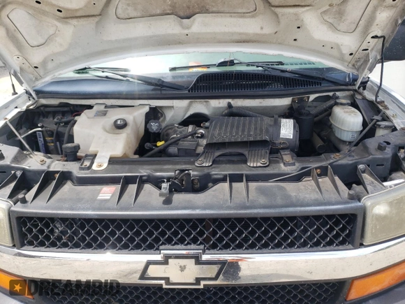 2005 Chevrolet Express Cargo with VIN 1GCFG15T051142218, listed as a Copart auction lot 57409005 with 185,725 mi miles and Salvage title. Bid and sale history available at DreamBid. Image 12.