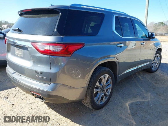 2020 Chevrolet Traverse Premier with VIN 1GNERKKW3LJ128117, listed as a IAAI auction lot 41857067 with 77,700 mi miles and . Bid and sale history available at DreamBid. Image 4.