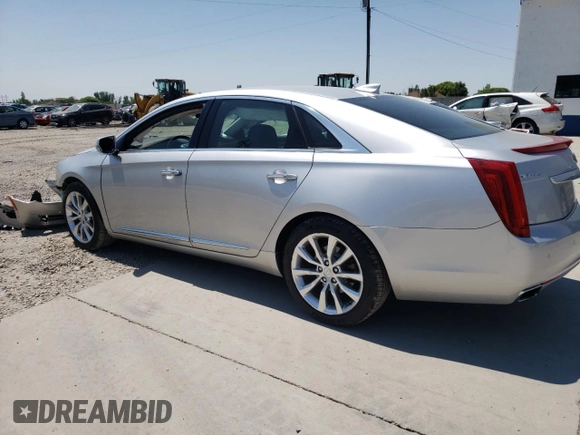 2016 Cadillac XTS Luxury Collection with VIN 2G61N5S35G9197325, listed as a Copart auction lot 55613225 with 131,404 mi miles and Salvage title. Bid and sale history available at DreamBid. Image 2.