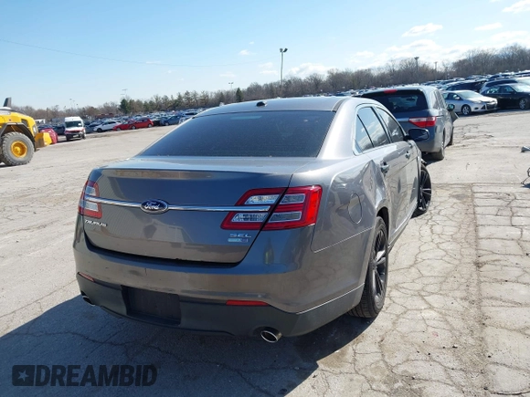 2013 Ford Taurus SEL z VIN 1FAHP2H83DG231000, wystawiony jako IAAI lot #41986420 z przebiegiem 200 390 mil mil oraz . Historia ofert i sprzedaży dostępna na DreamBid. Obrazek 4.