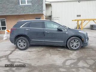 2021 Cadillac XT5 AWD Premium Luxury with VIN 1GYKNDRS7MZ168493, listed as a IAAI auction lot 41395162 with 33,064 mi miles. Bid and sale history available at carsss.com. Image 13.