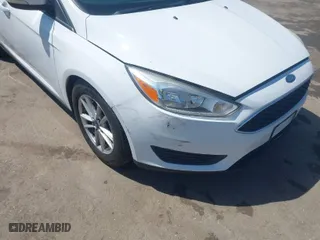 2015 Ford Focus SE with VIN 1FADP3K21FL246601, listed as a IAAI auction lot 41985398 with 139,782 mi miles. Bid and sale history available at carsss.com. Image 6.