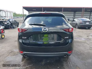 2019 Mazda CX-5 Touring with VIN JM3KFACM6K0672294, listed as a IAAI auction lot 42003210 with 50,127 mi miles. Bid and sale history available at carsss.com. Image 15.