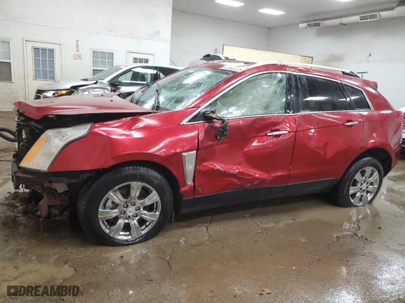 2015 Cadillac SRX Luxury Collection with VIN 3GYFNEE3XFS624606, listed as a Copart auction lot 41643015 with 121,787 mi miles and Clean Title. Bid and sale history available at carsss.com. Image 1.