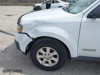 2008 Mazda Tribute Touring with VIN 4F2CZ961X8KM28763, listed as a IAAI auction lot 42048490 with 158,361 mi miles. Bid and sale history available at carsss.com. Image 6.