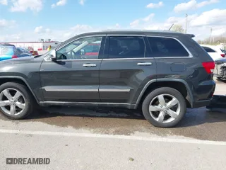 2011 Jeep Grand Cherokee Limited with VIN 1J4RR5GG4BC624876, listed as a IAAI auction lot 41877272 with 166,810 mi miles. Bid and sale history available at carsss.com. Image 14.