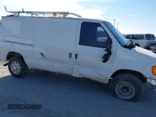 2006 Ford Econoline Cargo with VIN 1FTSE34L66HB03093, listed as a IAAI auction lot 41197550 with 310,863 mi miles. Bid and sale history available at carsss.com. Image 6.