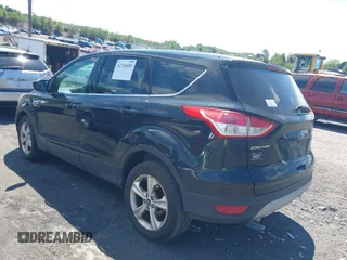 2014 Ford Escape SE with VIN 1FMCU9GX9EUA18422, listed as a IAAI auction lot 42765689 with 153,235 mi miles and . Bid and sale history available at DreamBid. Image 3.