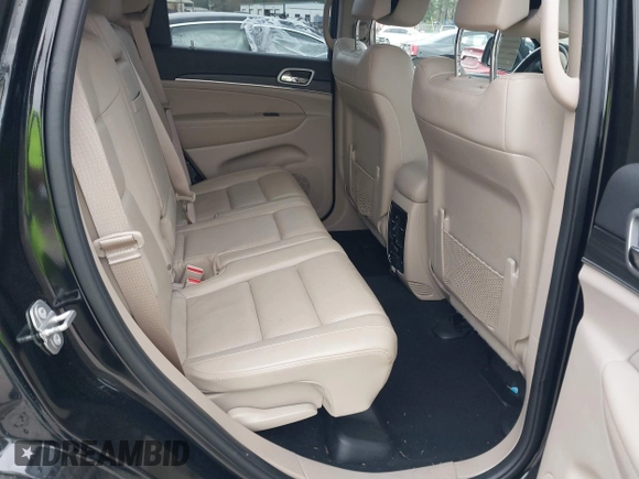 2021 Jeep Grand Cherokee Limited with VIN 1C4RJFBG8MC678548, listed as a IAAI auction lot 41912645 with 73,594 mi miles and . Bid and sale history available at DreamBid. Image 8.