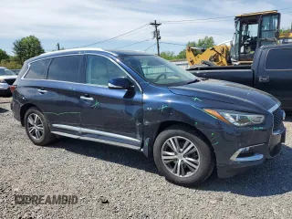 2020 Infiniti QX60 Luxe with VIN 5N1DL0MM2LC528742, listed as a Copart auction lot 56390605 with 66,786 mi miles and Salvage title. Bid and sale history available at DreamBid. Image 4.
