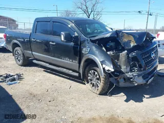 2017 Nissan Titan XD PRO-4X with VIN 1N6BA1F45HN568746, listed as a IAAI auction lot 41704216 with 115,857 mi miles. Bid and sale history available at carsss.com. Image 1.