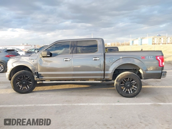 2015 Ford F-150 XLT with VIN 1FTEW1EFXFFA07342, listed as a IAAI auction lot 41748383 with 162,218 mi miles. Bid and sale history available at carsss.com. Image 14.