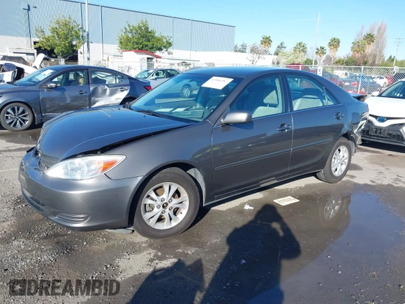 2004 Toyota Camry LE with VIN 4T1BF30K94U577260, listed as a IAAI auction lot 41906287 with 68,499 mi miles. Bid and sale history available at carsss.com. Image 2.