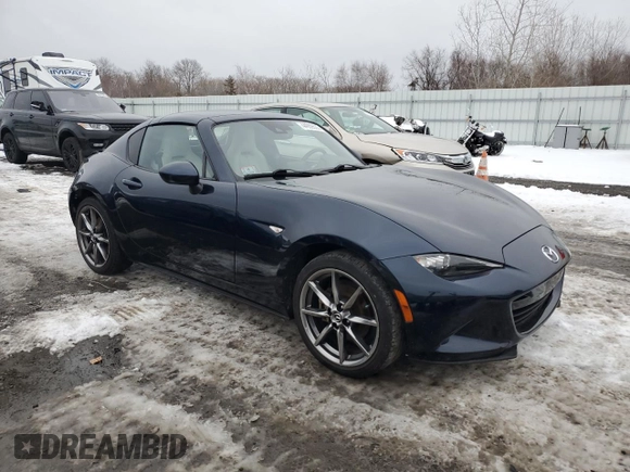 2021 Mazda MX-5 Miata Grand Touring with VIN JM1NDAM77M0454582, listed as a Copart auction lot 44959535 with 44,438 mi miles and Salvage title. Bid and sale history available at DreamBid. Image 4.