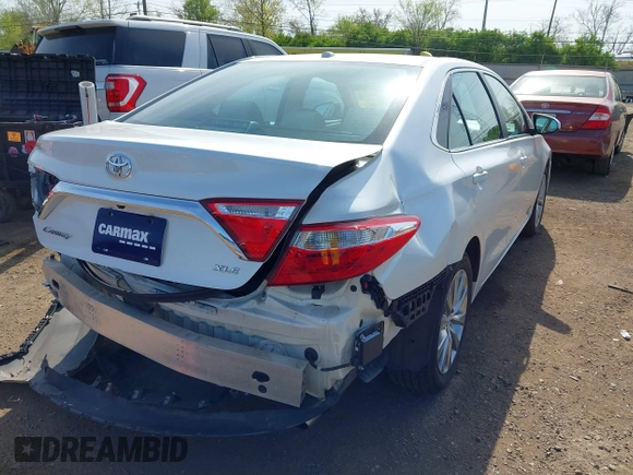 2015 Toyota Camry XLE with VIN 4T1BF1FK1FU977554, listed as a IAAI auction lot 42083589 with 104,811 mi miles and . Bid and sale history available at DreamBid. Image 4.