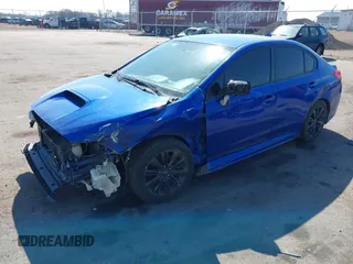 2015 Subaru WRX with VIN JF1VA1A60F9825977, listed as a IAAI auction lot 42059651 with 137,234 mi miles and . Bid and sale history available at DreamBid. Image 2.