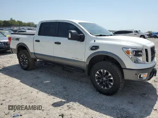 2017 Nissan Titan SV with VIN 1N6AA1E53HN570453, listed as a Copart auction lot 52941025 with 146,705 mi miles and Salvage title. Bid and sale history available at DreamBid. Image 4.