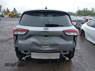 2021 Ford Escape SE Hybrid z VIN 1FMCU0BZ4MUA38497, wystawiony jako IAAI lot #42306761 z przebiegiem 20 555 mil mil oraz . Historia ofert i sprzedaży dostępna na DreamBid. Obrazek 17.