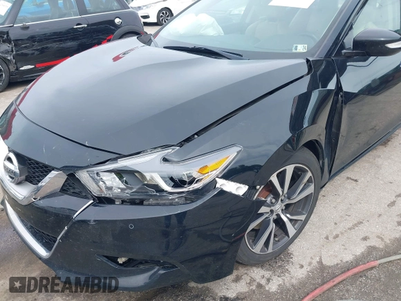 2017 Nissan Maxima Platinum with VIN 1N4AA6AP2HC404319, listed as a IAAI auction lot 42225731 with 156,833 mi miles and . Bid and sale history available at DreamBid. Image 21.